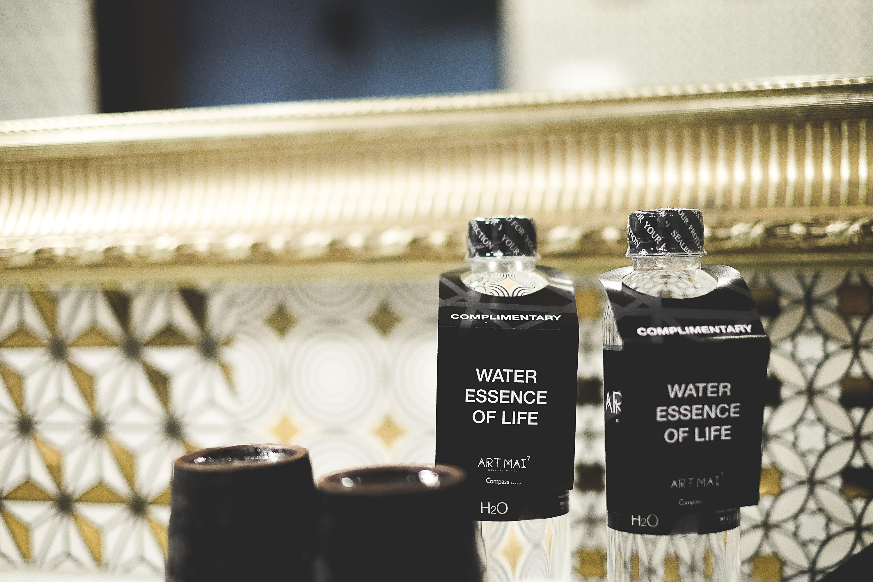 Art Mai Gallery Nimman Hotel Chiang Mai Zewnętrze zdjęcie Bottles of water at the Ritz-Carlton